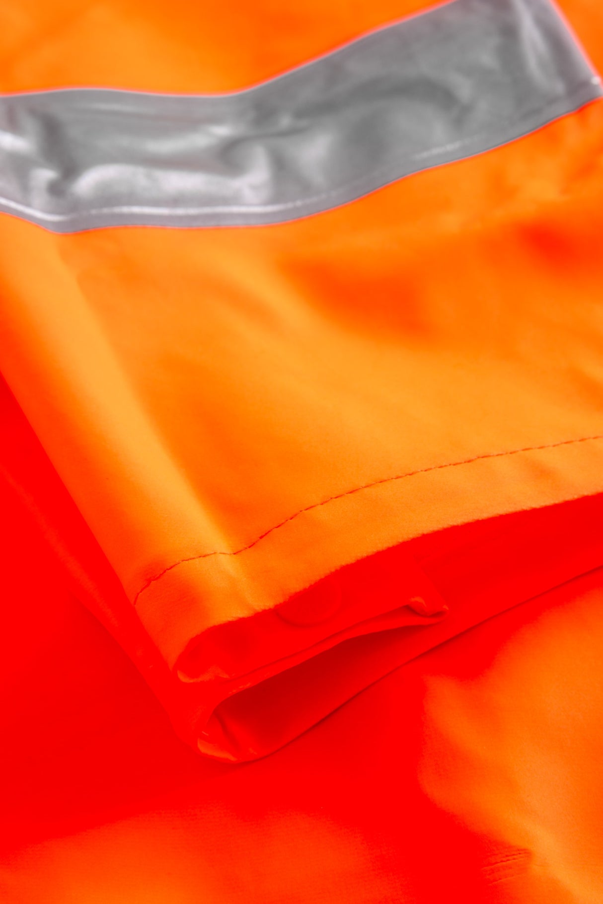 Multinorm Hi-Vis bukser i ekstra kraftig PVC kvalitet - Hi-Vis Orange