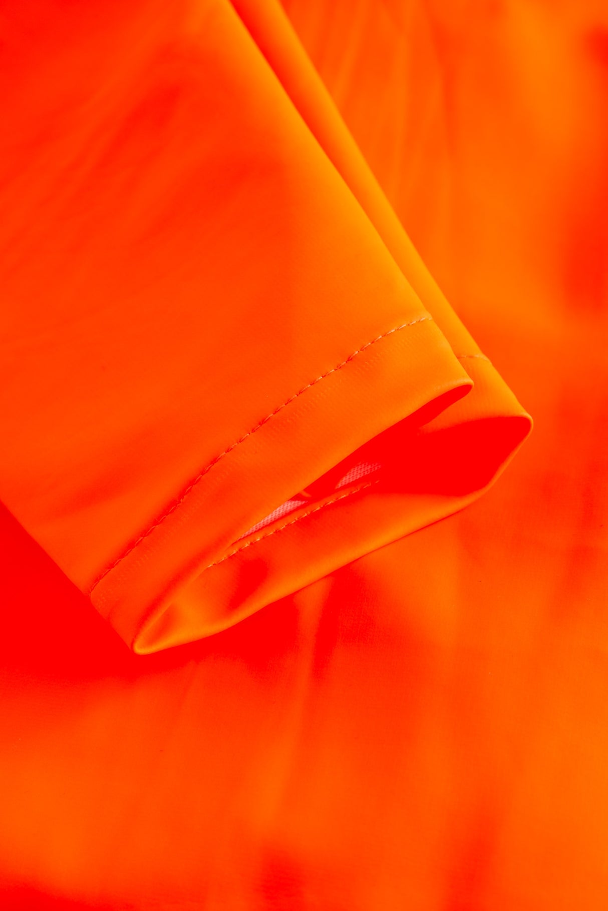 Multinorm Hi-Vis jakke i ekstra kraftig PVC kvalitet - Hi-Vis Orange