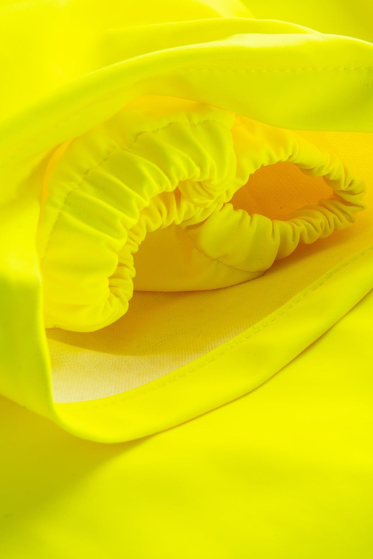 Multinorm Hi-Vis dragt i ekstra kraftig PVC kvalitet - Saturn Gul