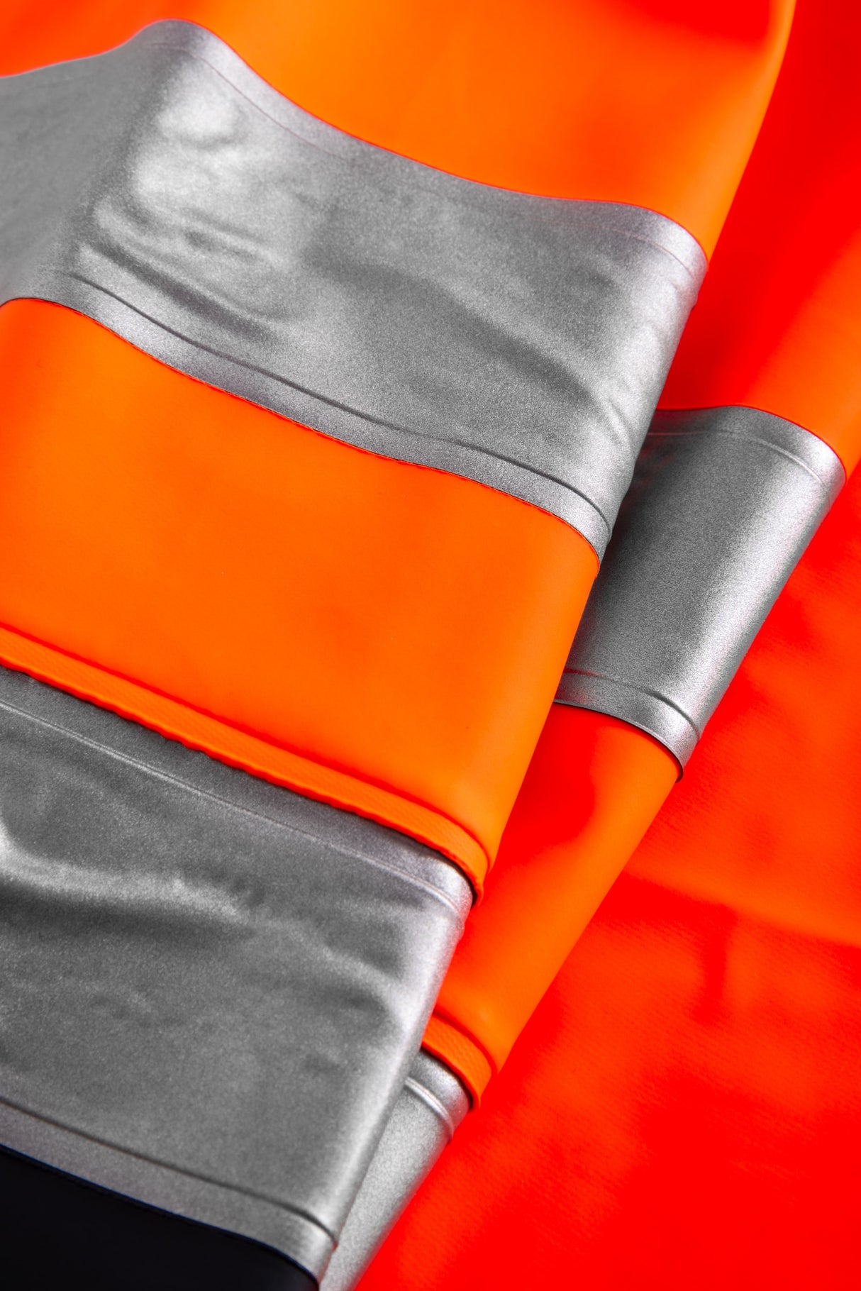 Multinorm Hi-Vis bukser i ekstra kraftig PVC kvalitet - Hi-Vis Orange / Navy