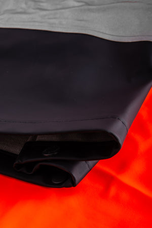 Multinorm Hi-Vis bukser i ekstra kraftig PVC kvalitet - Hi-Vis Orange / Navy