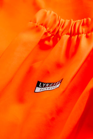 Multinorm Hi-Vis bukser i ekstra kraftig PVC kvalitet - Hi-Vis Orange