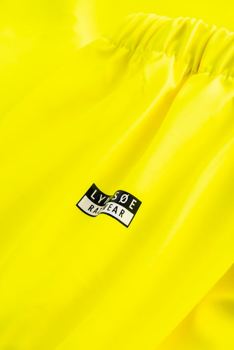 Multinorm Hi-Vis bukser i ekstra kraftig PVC kvalitet - Saturn Gul / Navy