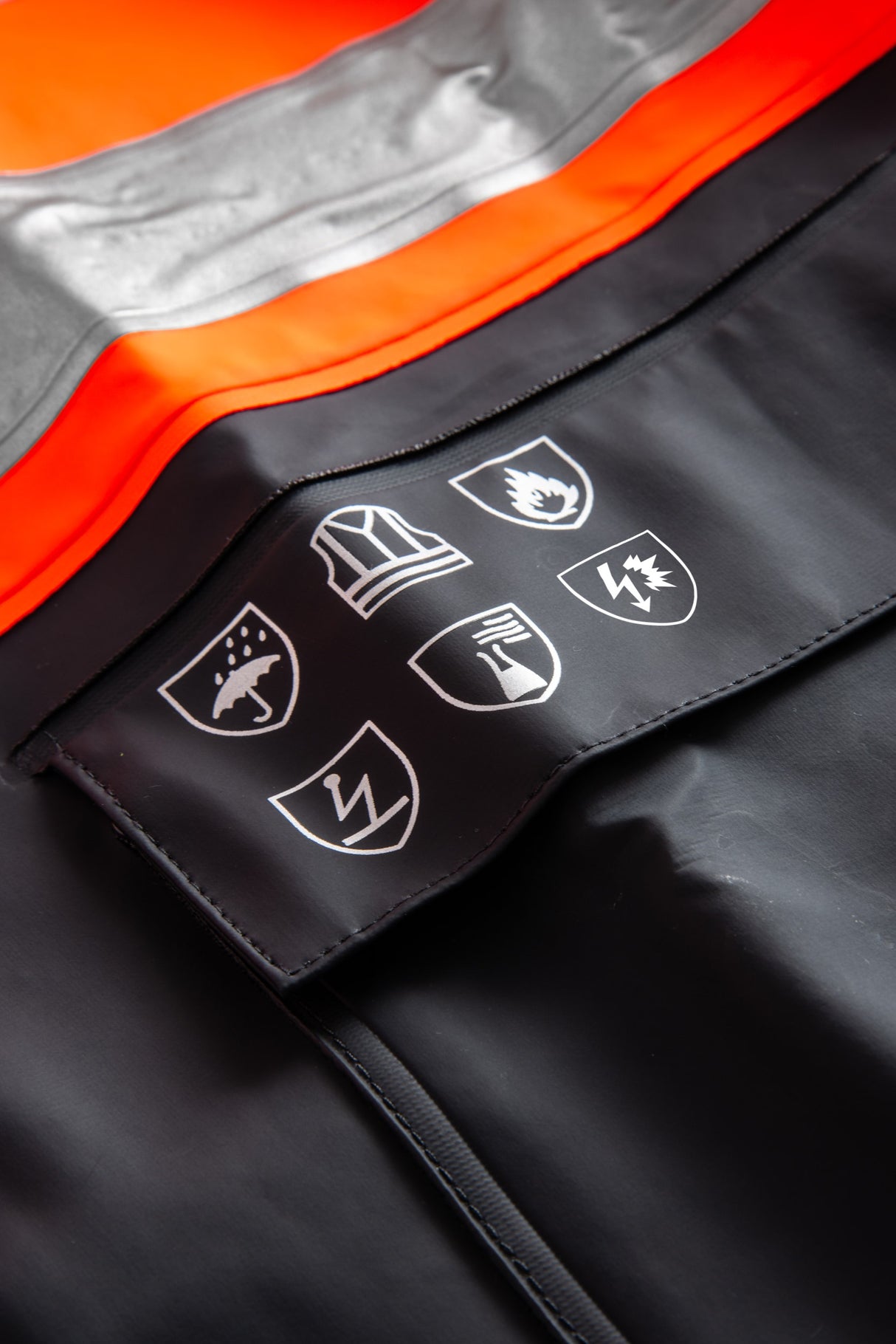 Multinorm Hi-Vis jakke i ekstra kraftig PVC kvalitet - Hi-Vis Orange / Navy