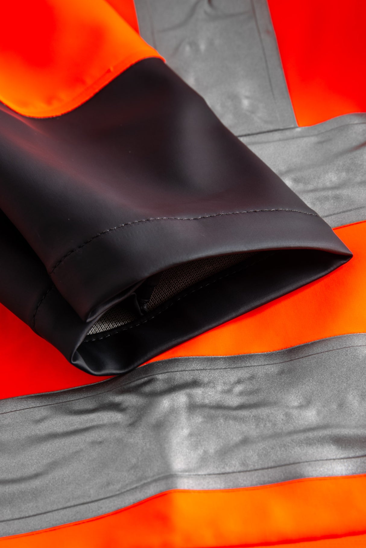 Multinorm Hi-Vis jakke i ekstra kraftig PVC kvalitet - Hi-Vis Orange / Navy