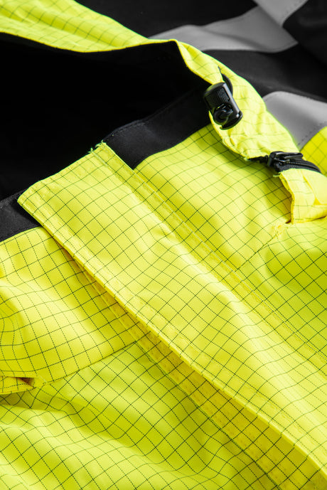 Brandhæmmende Hi-Vis skaljakke i kraftig rivfast kvalitet - Saturn Gul / Sort