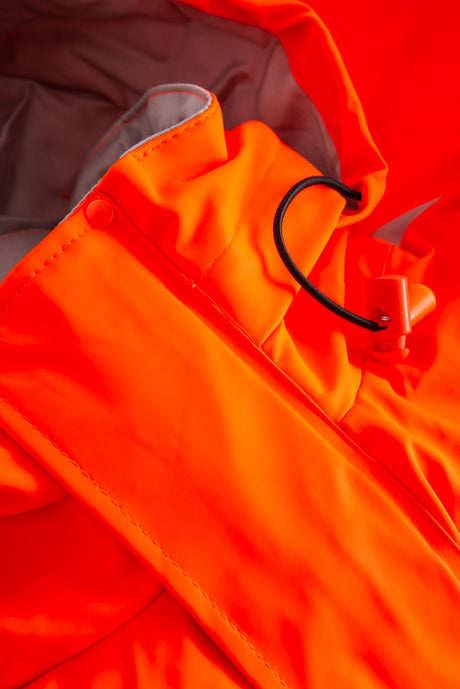 Brandhæmmende Hi-Vis vinterjakke i pilotmodel i PU kvalitet med fast quiltet foer - Hi-Vis Orange